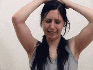 The Cane For Heather - schoolgirl caned over DESK-3.gif